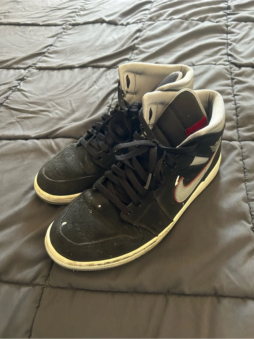 Nike Jordan Men’s Black and White High-Top Sneakers